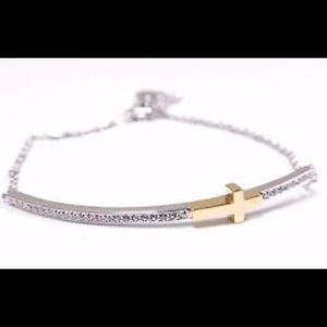 Swarovski gold-tone cross bangle